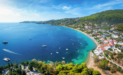 The bay and beach of Megali Ammos next to the town of Skiathos island, Sporades, Greece
