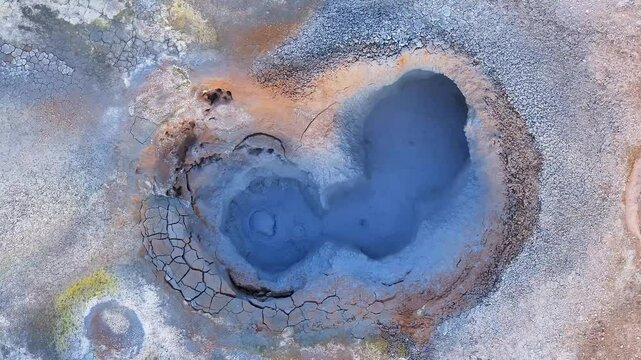 Aerial view of sulfuric smokers hot springs with colorful geothermal formations and steam, Namafjall Hverir, Northern Region, Iceland.