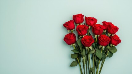 Obraz premium Bouquet of Red Roses on a Blue Background