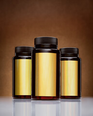 hree amber bottles with black lids arranged closely on a reflective surface, set against a warm...
