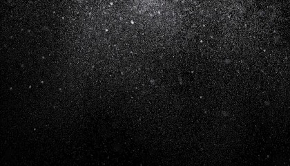 Close-up of Raindrops Falling in the Dark. High-Contrast Abstract Texture of Water Droplets Against a Black Background
