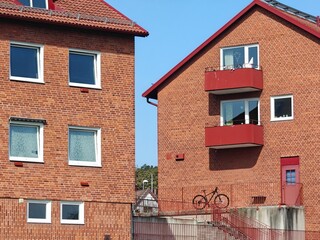 Typical small red brick apartment buildings in Sweden
