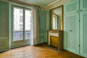 old parisian room with fireplace