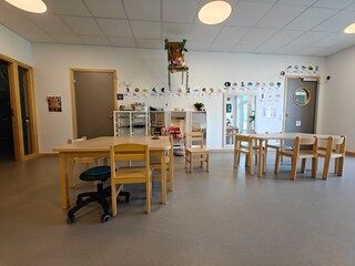 Stylish and comfortable European kindergarten for small children, classroom. Daycare playing room, playroom, game room.