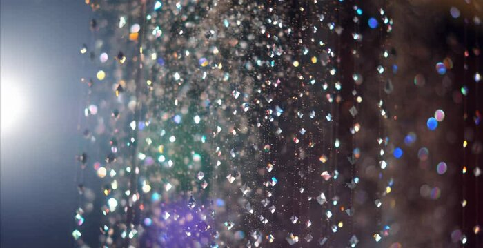 Shiny glitter halographic background, beautiful luxury premium background in motion of shiny diamond particles, copy space