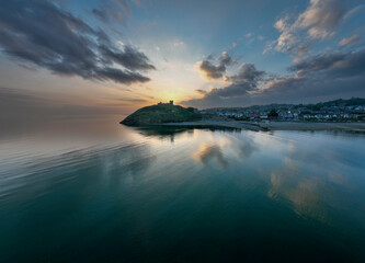 Sunset over Criccieth Castle on the Llyn Peninsula in North Wales, UK
