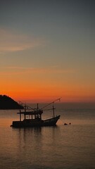 boat at sunset