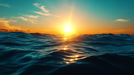Obraz premium A breathtaking sunset casts a warm glow over the rippling ocean waves, evoking feelings of tranquility, peace, and the vastness of nature. The vibrant colors symbolize hope, new beginnings, and the be