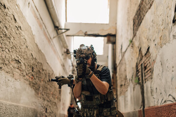 Front view of group of air soft players with weapons playing battle game