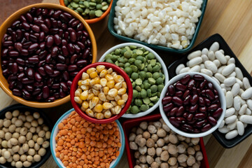 several pots with raw grains for preparing healthy food