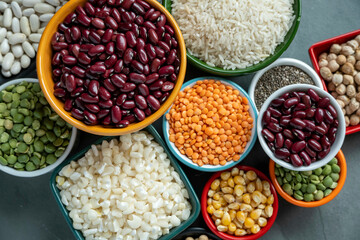 several pots with raw grains for preparing healthy food