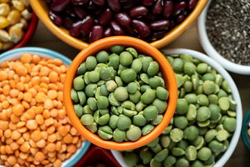 several pots with raw grains for preparing healthy food