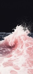 Fototapeta premium A pink wave crashes against a dark background.