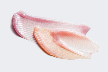 Multicolored lip gloss set textured swatch on gray background