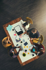 Top view, paperwork or designers in meeting for discussion, teamwork or brainstorming in startup....