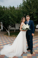 the first meeting of the bride and groom in the courtyard of the hotel
