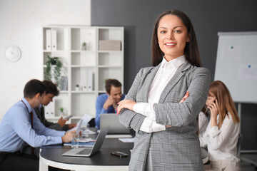 Female business consultant working in office