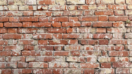 The texture of the red brick wall a lot of rows.