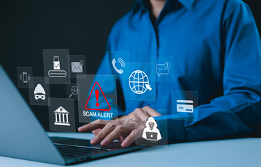 Cybersecurity concept. Scam Alert Warning, A person typing on laptop with scam alert icons, including symbols for phishing, online fraud, identity theft, Unknown person, online threats, Cyber security