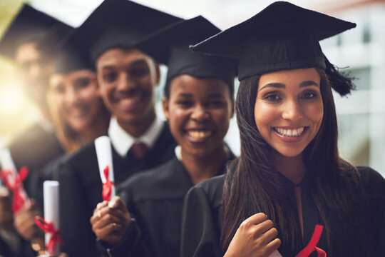 Graduation, college and portrait of students with certificate for achievement, smile and success in education. Diploma, friends and happy people on university campus with solidarity at award ceremony