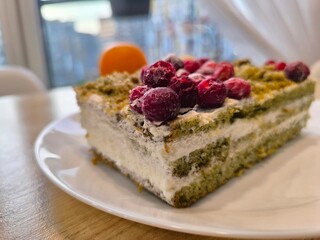 Cottage cheese sponge cake with cranberries on a plate. High quality photos