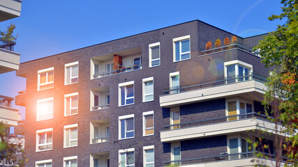 European residential architecture harmonizing with nature. Eco-friendly living in city with greens....
