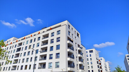 Fototapeta premium Modern architecture of urban residential apartment building. Apartment building exterior, residential house facade.