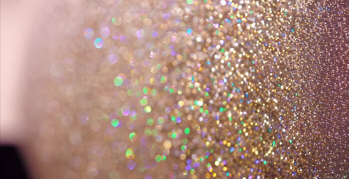 Shiny glitter halograohic background, beautiful luxury premium background in motion of shiny diamond particles, copy space