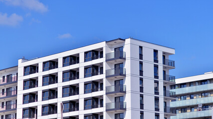 Fototapeta premium Modern architecture of urban residential apartment building. Apartment building exterior, residential house facade.