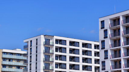 Fototapeta premium Modern architecture of urban residential apartment building. Apartment building exterior, residential house facade.