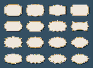 Set of vintage blank labels with ornate borders on a dark blue background