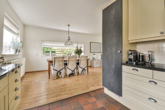 Spacious kitchen with dining area and natural light