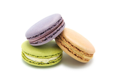 Sweet colorful varied assortment macarons cookies with filling isolated on a white background. Handmade traditional sweets. Clipping Path.