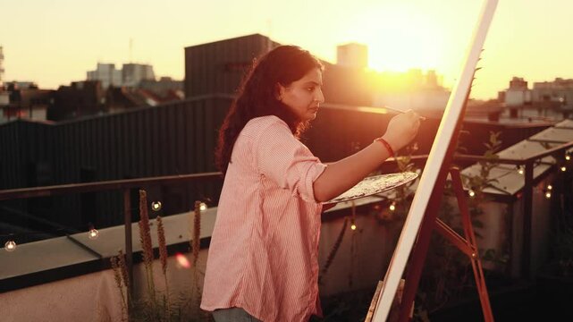 Portrait of exhausted young indian woman artist student with failed ideas while take a break at creative workshop Lack of inspiration and creative crisis concept