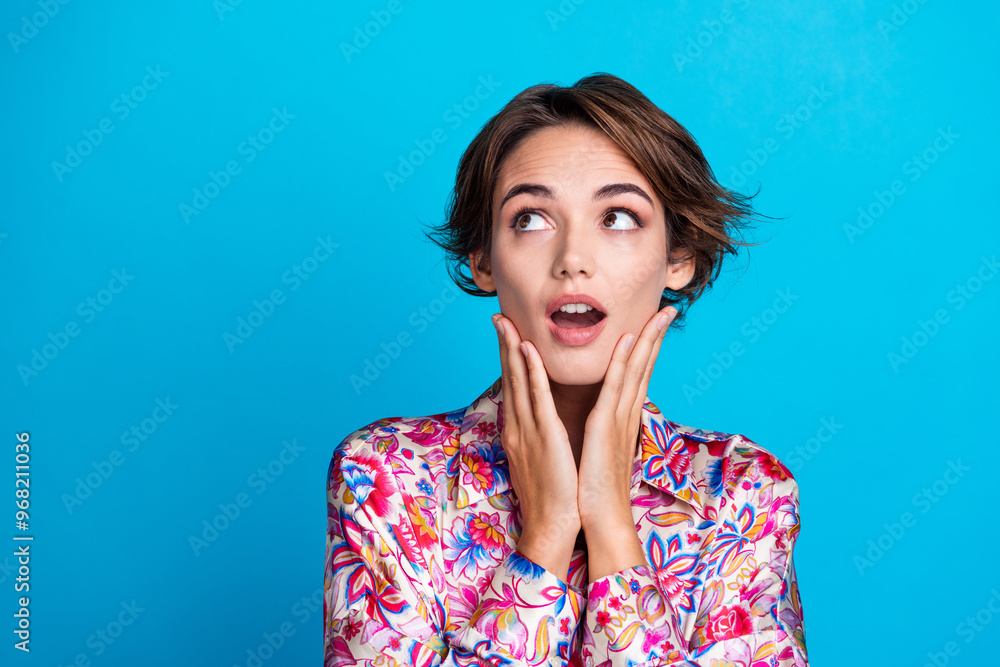 Wall mural photo of excited adorable girl wear flowers print clothes two arm touch cheeks special news empty sp