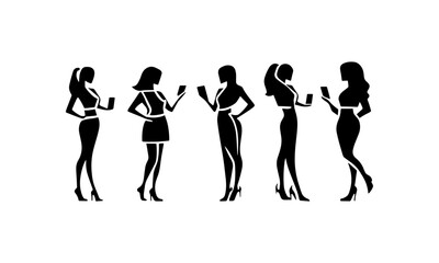 vector silhouettes of a business woman in a beautiful business suit and with a smartphone in her hand