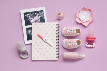 Composition with baby shoes, sonogram images, pregnancy test and nipples on purple background