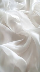 White silk fabric texture, abstract background. Elegant drapery and luxury textile concept
