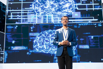 Portrait of jolly presenter speaking at tech conference, exploring latest AI technology trends and...