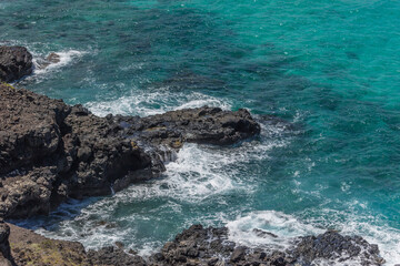Dramatic Ocean crashing wave Hawaii at Makapu Point