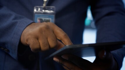 Technician in server hub checking recovery plan on tablet, monitoring energy consumption across mainframes. Close up shot of man in data center making sure rigs are functioning optimally, camera A