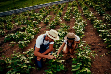 Father, daughter and work on farm for bonding, talking and development with agriculture...