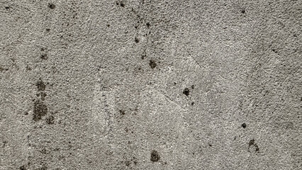 The pattern of surface wall concrete for background. Abstract of surface wall concrete for vintage background. Rusty damaged to surface wall. Wall texture for background.