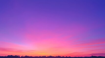 Vibrant sunset over horizon with purple and