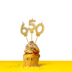 Birthday candle number 650 - Cupcake on white background