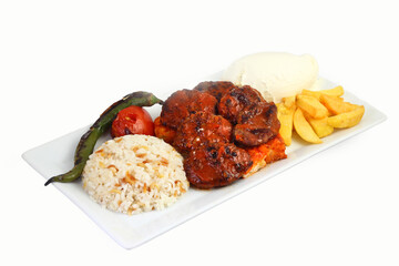 Plate of traditional grilled meatballs on white background