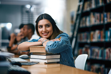Education, studying and woman with books in library, thinking and smile for learning, ideas and...