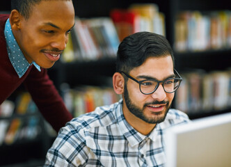 Obraz premium People, education and computer lab in university with project, assignment and deadline in IT course. Students, technology and scholarship in college with desktop, internet and software for research