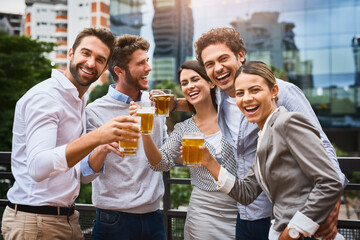 Business people, outdoor portrait and alcohol for team event, laughing and motivation on rooftop. Employees, beer and celebration of company success or hard work, diversity and drinking together