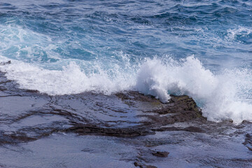 Dramatic Ocean crashing wave Hawaii at Makapu Point